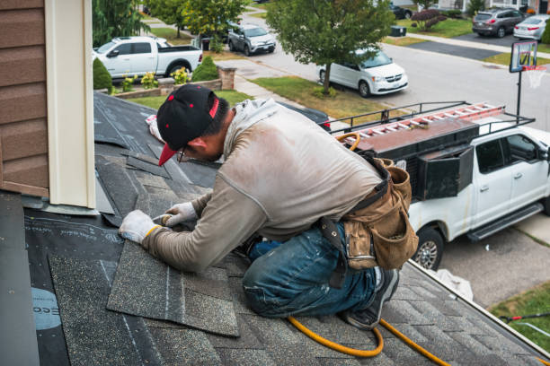 Professional Roofing technician working in Adams, OR
